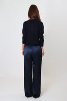 Navy satin pants with relaxed fit and mid-rise elastic waist – April Seven