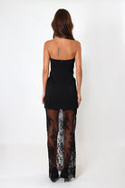 April Seven black strapless maxi dress with lace bottom – elegant floor-length silhouette.