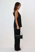 Black satin pants with soft drape and elastic waistband – April Seven