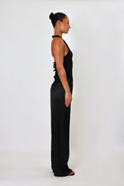 April Satin Pant Tall in black – mid-rise satin pant with extended length and elastic waistband.