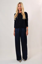 Navy satin pants with relaxed fit and mid-rise elastic waist – April Seven
