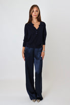 Navy satin pants with relaxed fit and mid-rise elastic waist – April Seven
