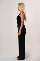 Elegant black satin pants styled for everyday comfort – April Seven