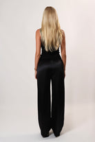 Elegant black satin pants styled for everyday comfort – April Seven