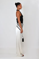 April Satin Pant Tall in white – mid-rise fit with long inseam and soft drape.